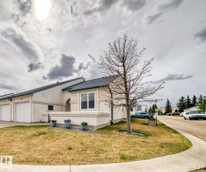 Property Photo:  9718 176 Street NW 49  AB T5T 6B8 