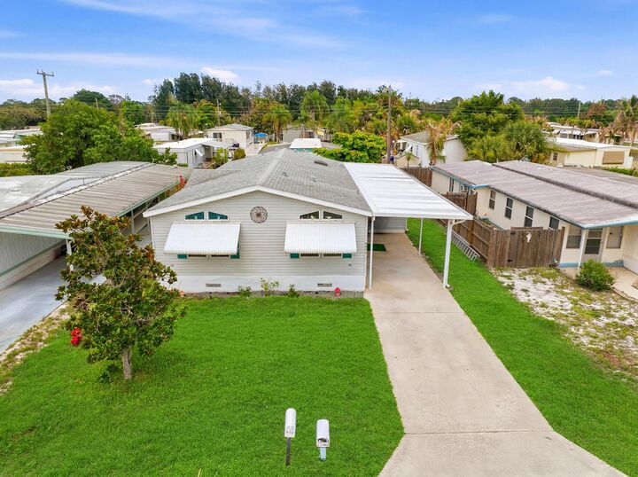 Property Photo:  8355 SE Wren Avenue  FL 33455 