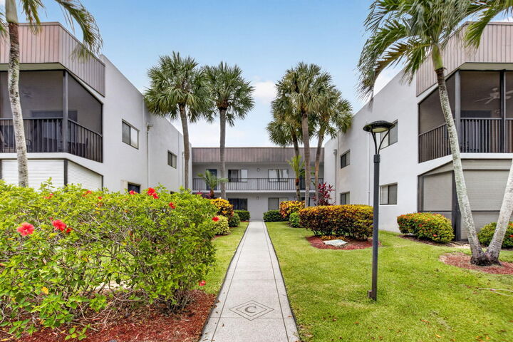 Property Photo: 15054 Ashland Way 82 FL 33484