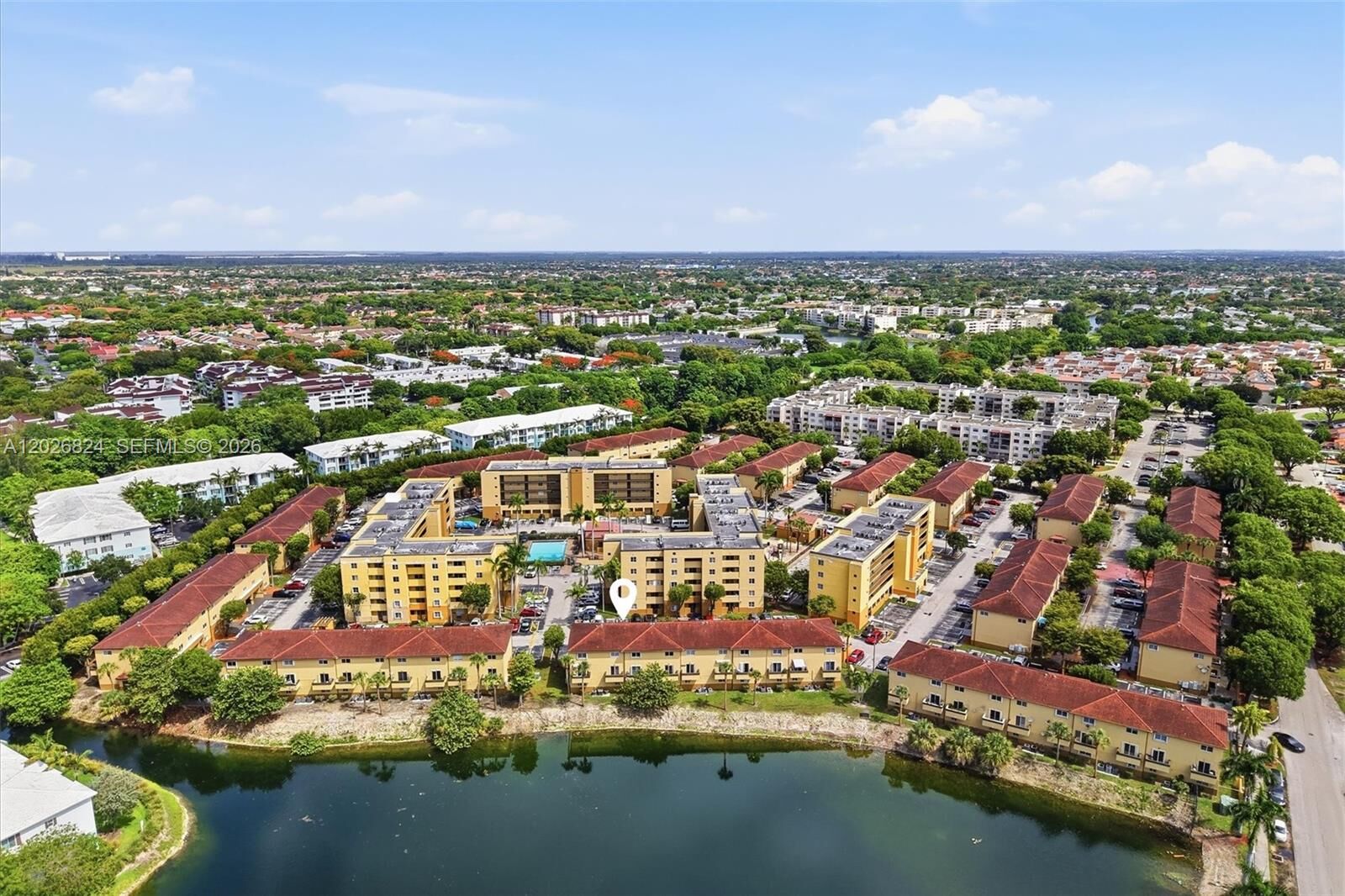 Property Photo:  8240 SW 149th Ct 7-201  FL 33193 