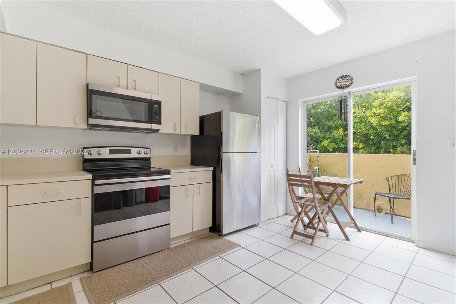 Property Photo:  8240 SW 149th Ct 7-201  FL 33193 