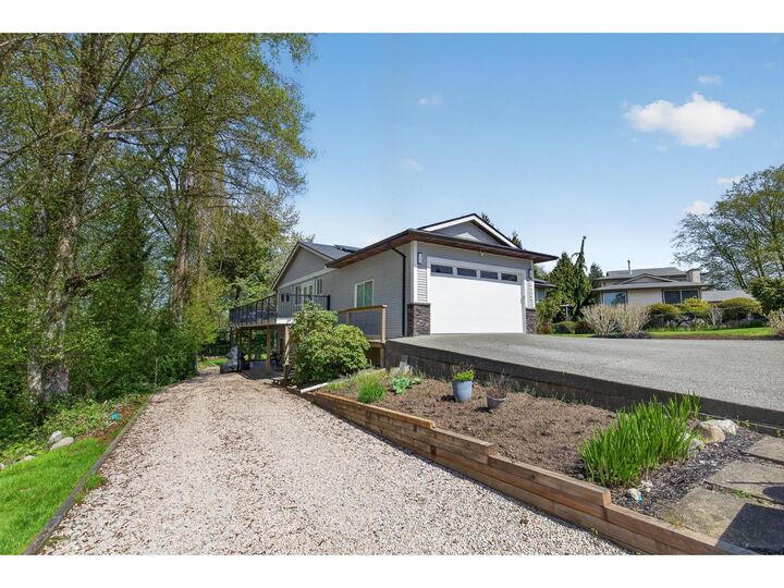 Property Photo:  19939 51 Avenue  BC V3A 7P2 