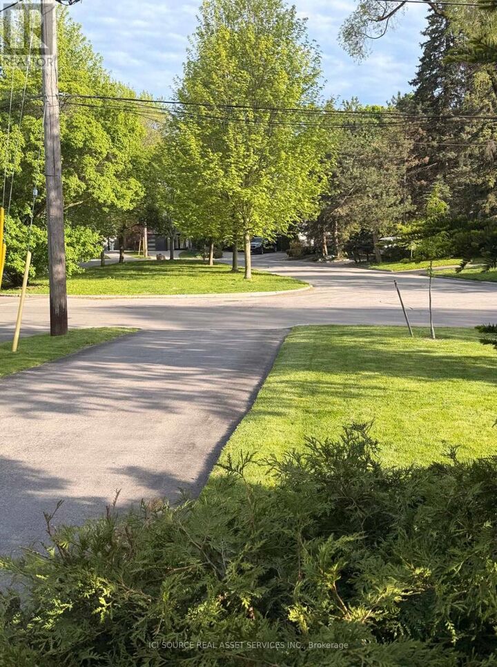 Property Photo: 203 Three Valleys Drive ON M3A 3L7