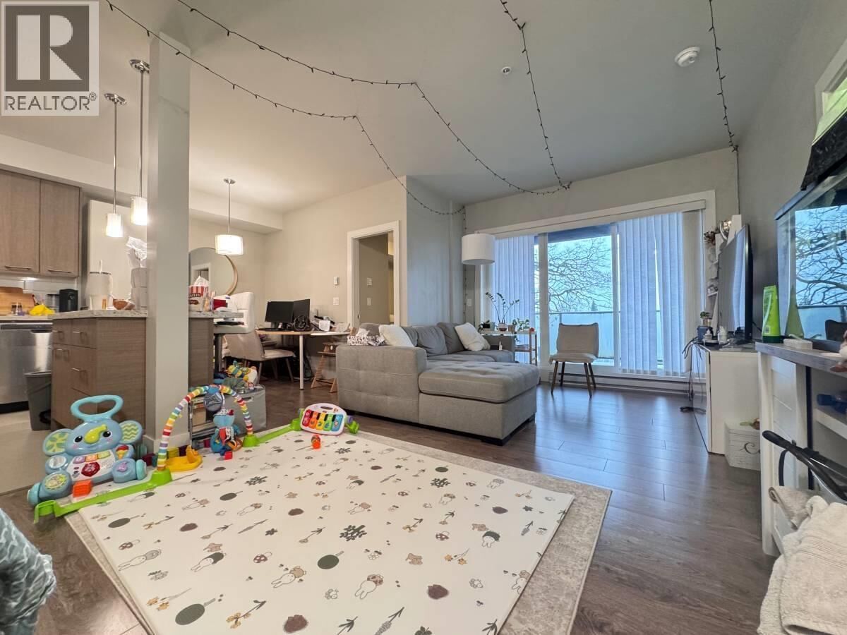 Property Photo:  7377 14th Avenue 305  BC V3N 1Z7 