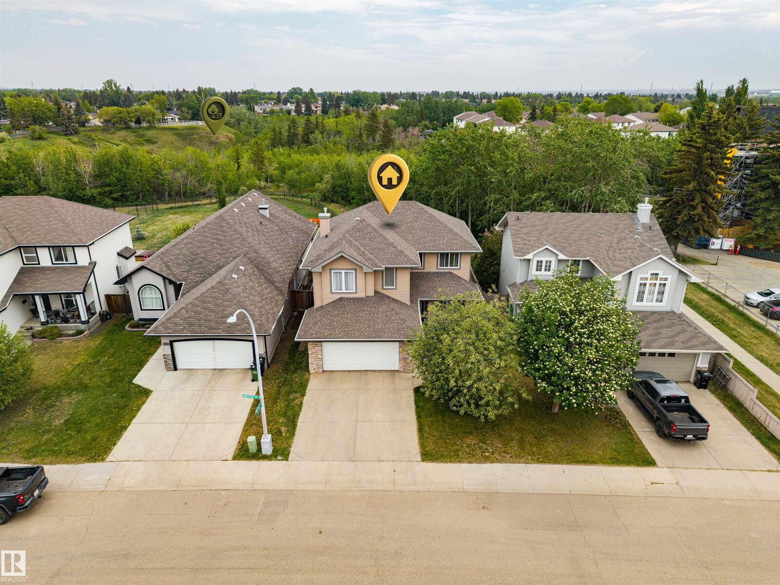 Property Photo:  57 Homestead Crescent NW  AB T5A 2Y1 
