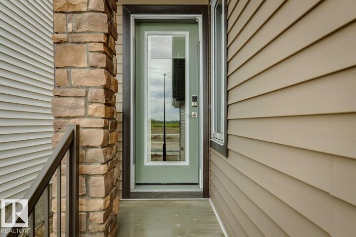 Property Photo: 2480 Egret Loop NW AB T6M 3R4