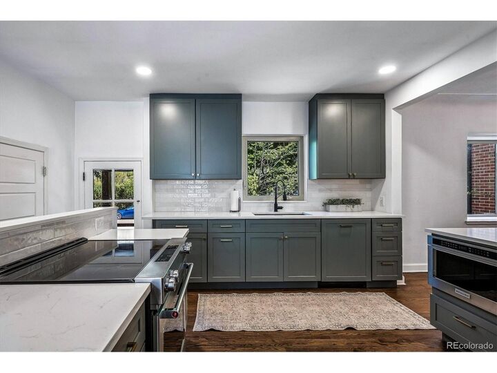 Property Photo:  1585 Krameria St  CO 80220 
