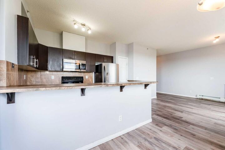 Property Photo: 1727 54 Street SE 425 AB T2A 1B7