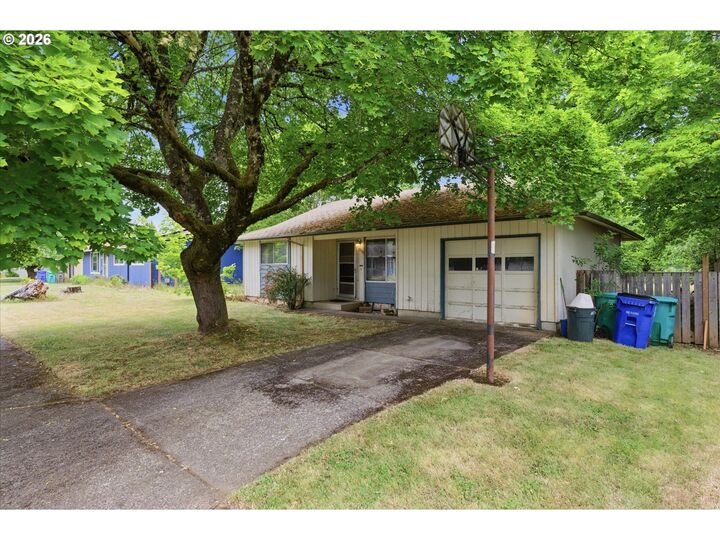 Property Photo:  13137 SE Francis St  OR 97236 