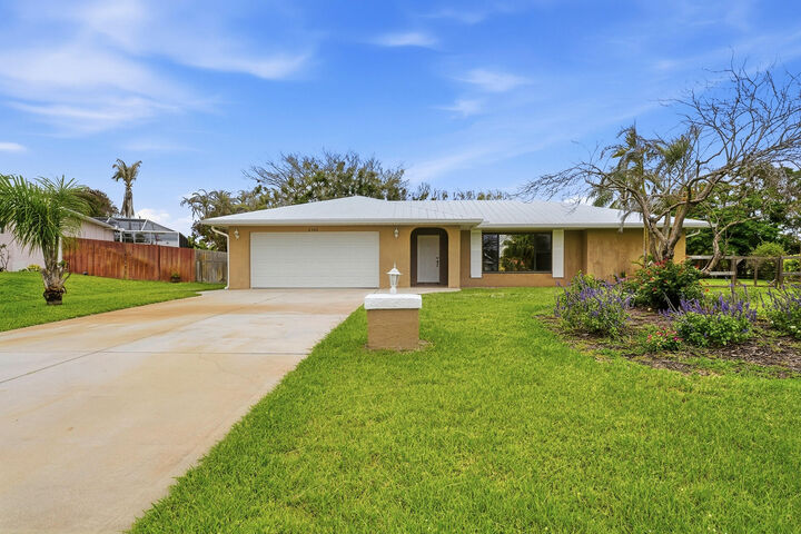 Property Photo:  2402 SE Perugia Street  FL 34952 
