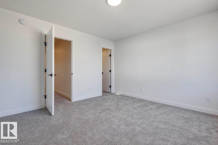 Property Photo:  710 Mattson Drive SW 9  AB T6X 1A4 