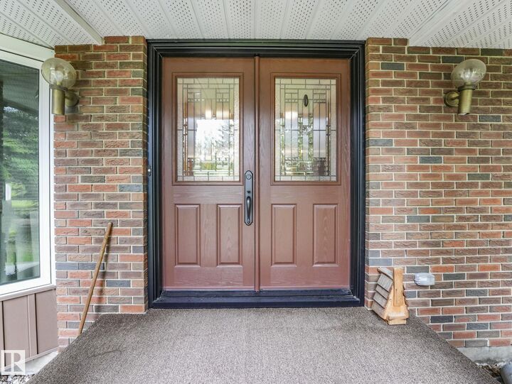 Property Photo: 11921 231 Street NW AB T5S 2C2