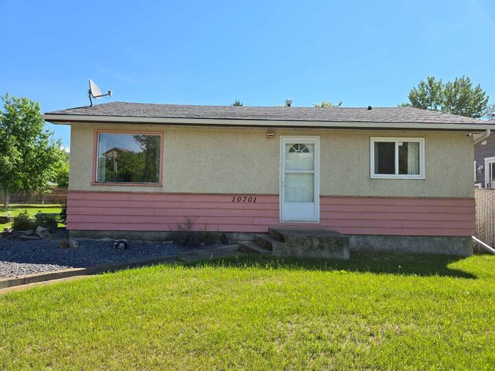 Property Photo: 10701 91 Street AB T8S 1R1