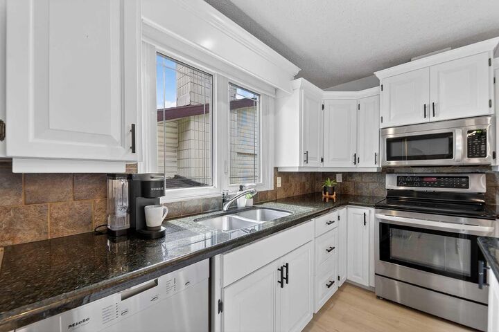 Property Photo: 240 Canniff Place SW AB T2W 2L8