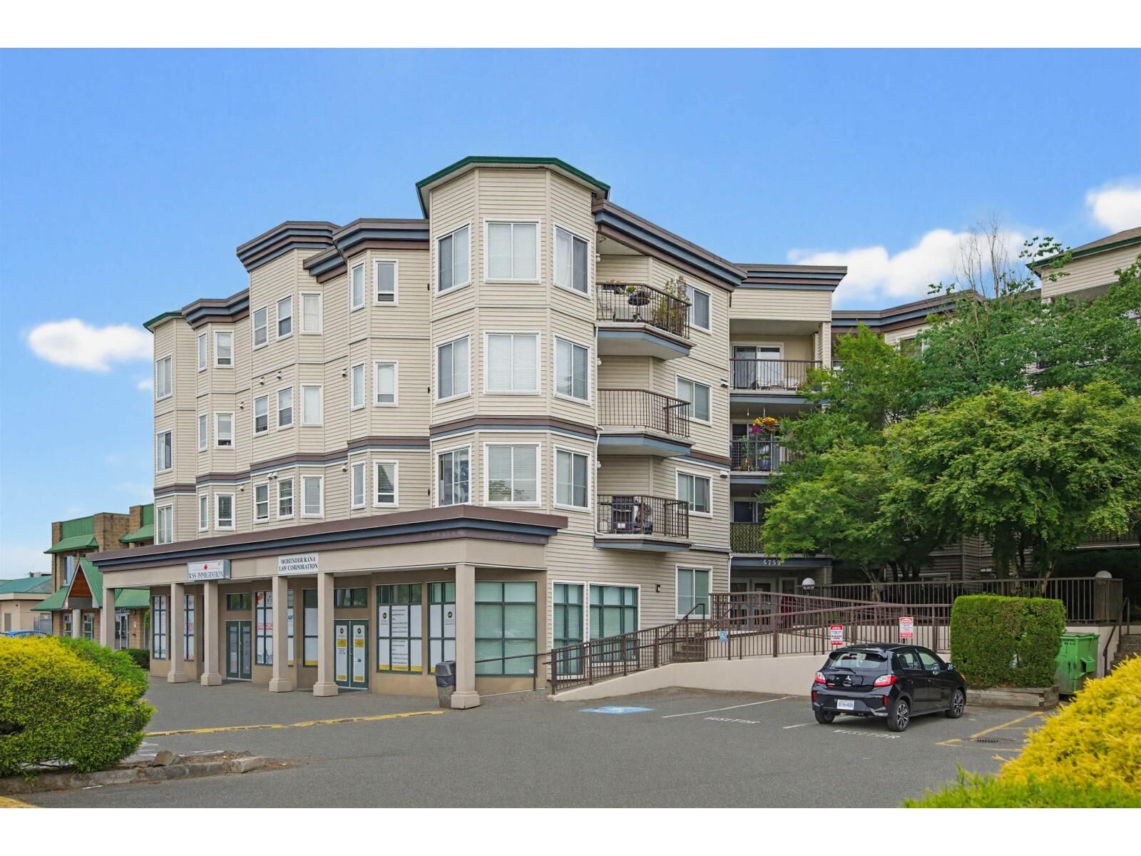 Property Photo:  5759 Glover Road 207  BC V3A 8M8 