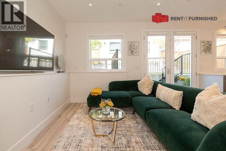 Property Photo:  3143 East 8th Avenue  BC V5M 1X5 