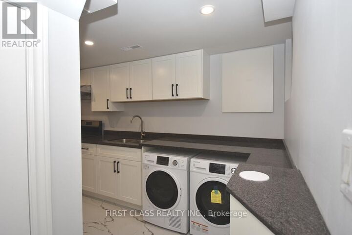 Property Photo:  133 Coxwell Avenue East Bsmt  ON M4L 3B4 