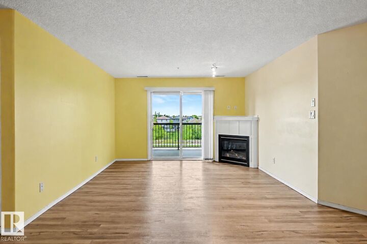 Property Photo: 2098 Blackmud Creek Drive SW 309 AB T6W 1T7