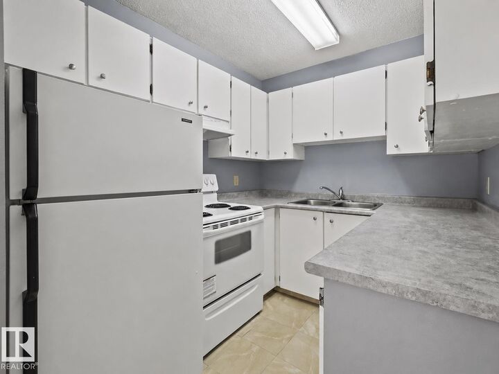 Property Photo: 13450 Fort Road NW 1 AB T5A 1C5