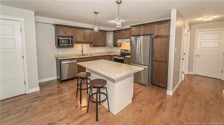 Property Photo: 65 Brayson Boulevard 209 NB E2V 0J2