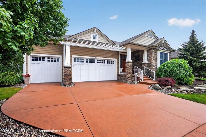 Property Photo:  624 Aquila Drive  MI 48823 