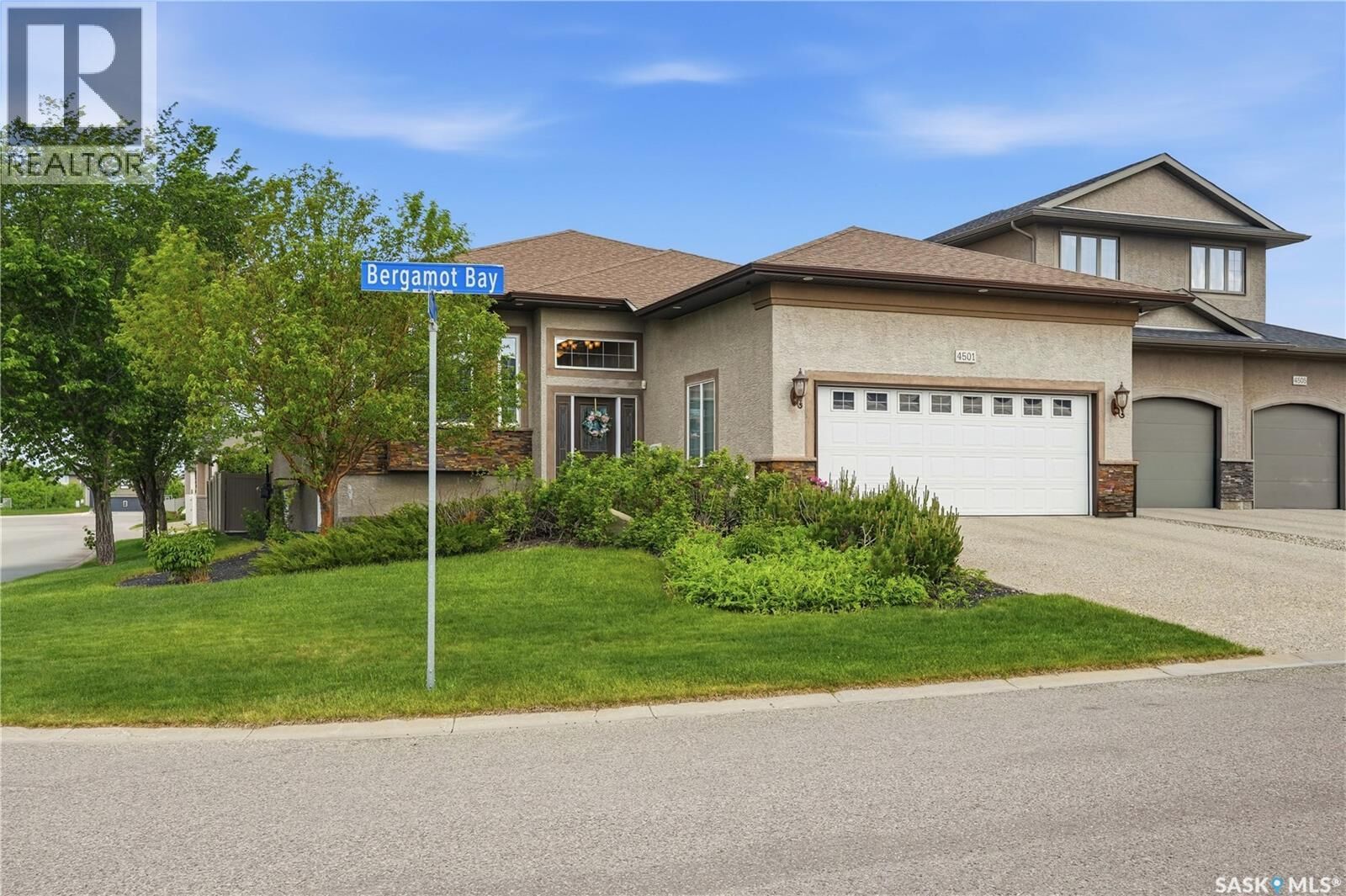 Property Photo:  4501 Bergamot Bay E  SK S4V 1M8 