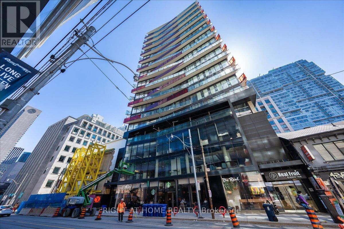 Property Photo:  215 Queen Street West 1907  ON M5A 1S2 