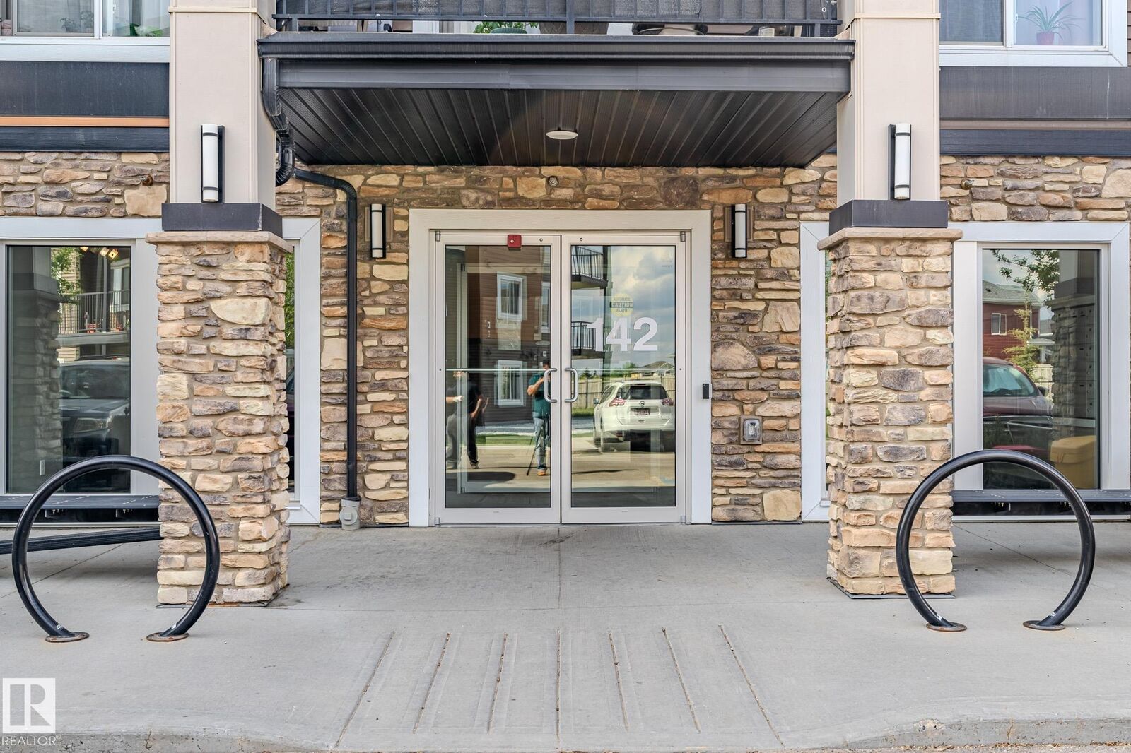 Property Photo:  142 Ebbers Boulevard NW 107  AB T5Y 3W2 