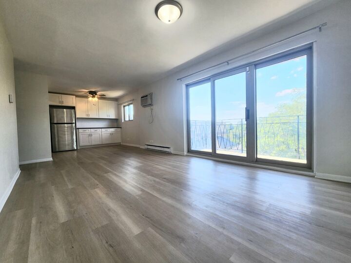Property Photo: 7432 Washington Street 602 IL 60130