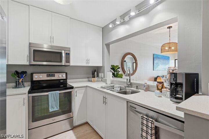 Property Photo:  803 River Point Drive 107B  FL 34102 