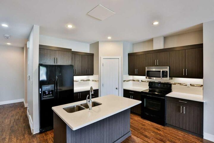 Property Photo:  1207B 19A Avenue  AB T1M 1A4 