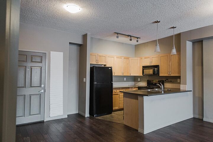 Property Photo:  12330 102 Street 120  AB T8V 0N4 