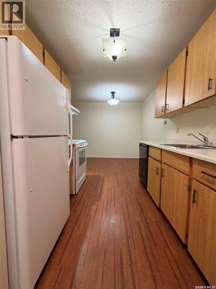 Property Photo:  726 310 Stillwater Drive  SK S7J 4H7 