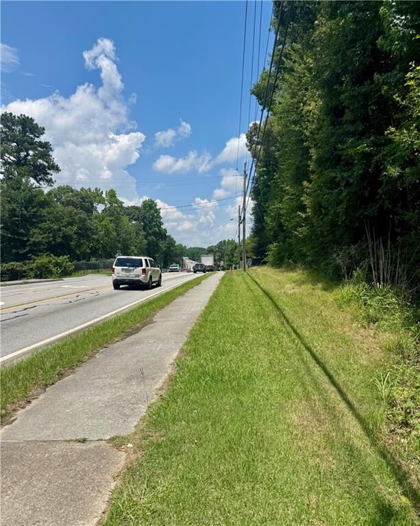 Property Photo:  5557 Oakdale Road SE  GA 30126 