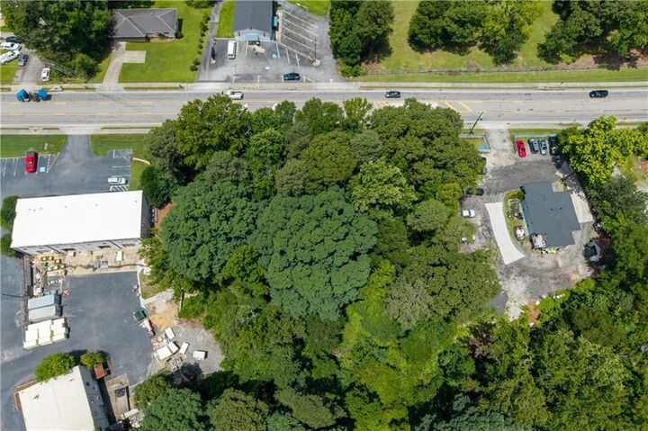Property Photo:  5557 Oakdale Road SE  GA 30126 