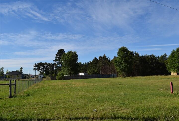 Property Photo: 1129 County Road 5100 TX 77327