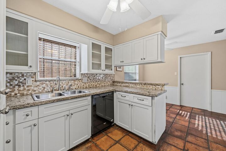 Property Photo: 8834 Sandstone Street TX 77036