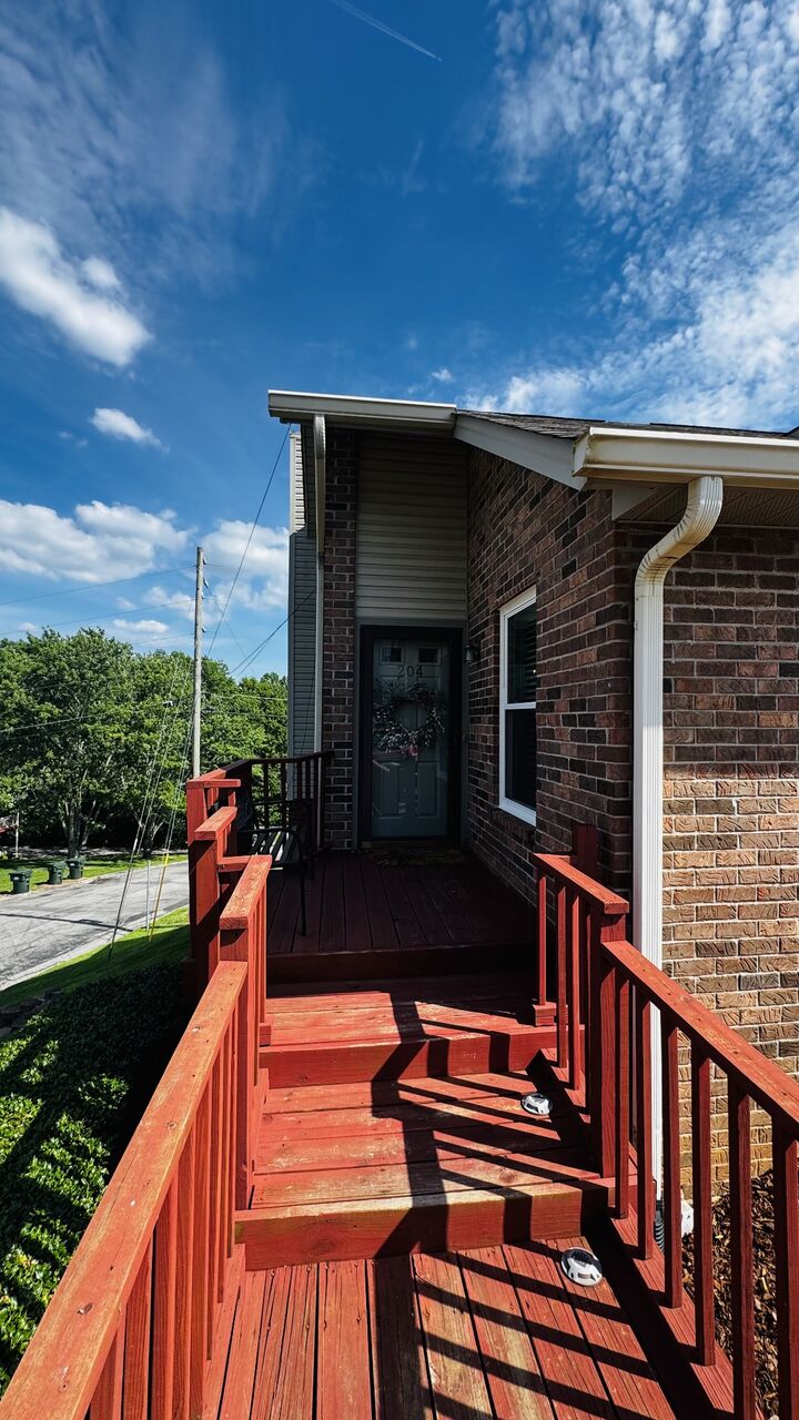 Property Photo:  204 Village Cir W  TN 37055 