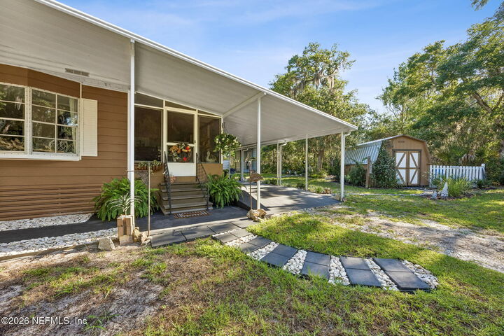 Property Photo:  110 Plumosa Drive  FL 32139 