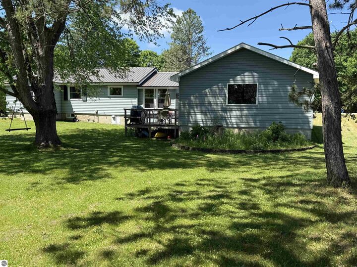 Property Photo:  3586 E Long Lake Road  MI 49685 
