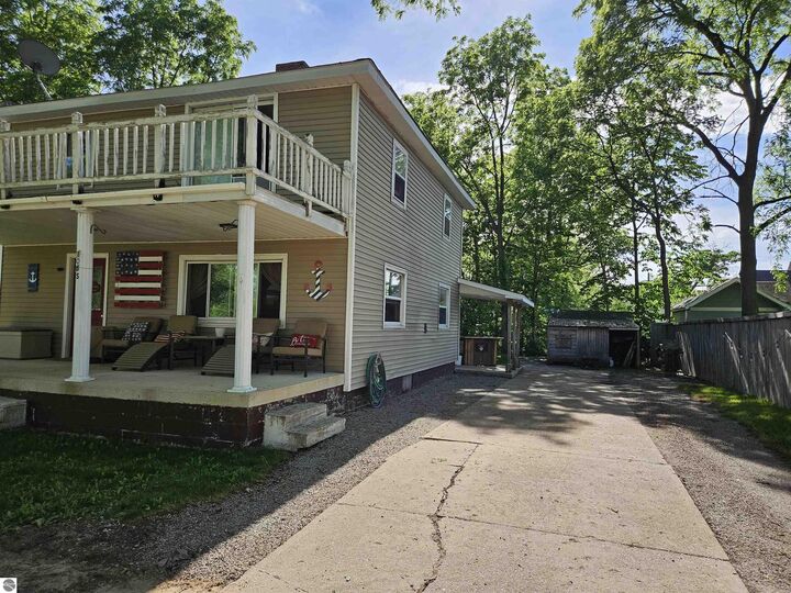 Property Photo:  108 S Huron  MI 49651 