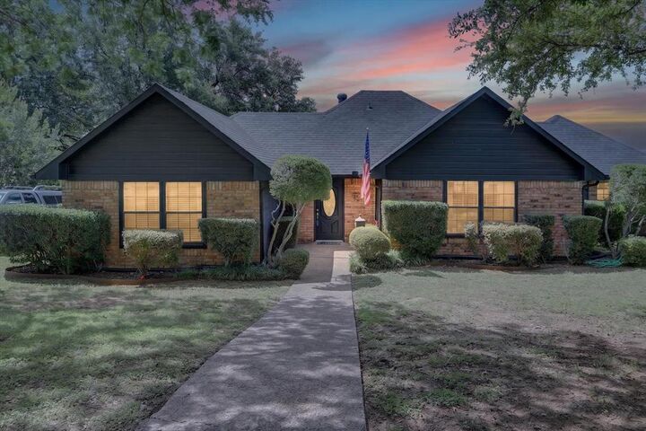 Property Photo: 1002 Capetown Drive TX 75050