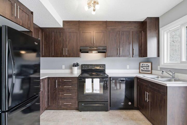 Property Photo: 237 Deerpoint Lane SE AB T2J 6M6