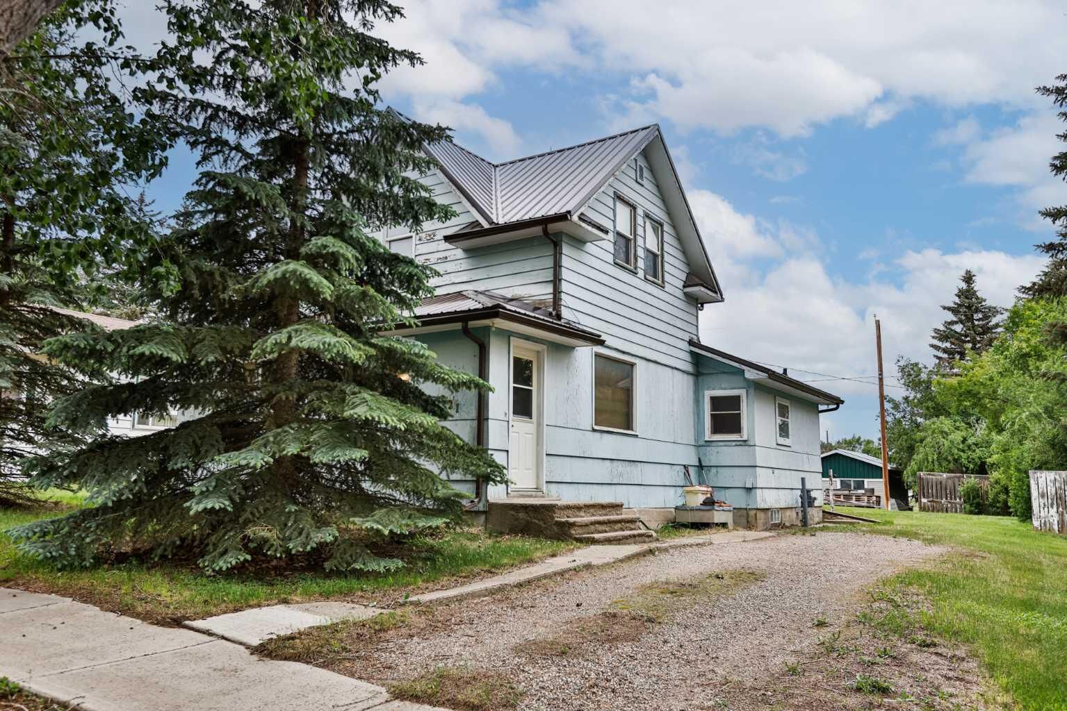 Property Photo:  221 1 Street S  AB T0L 1G0 