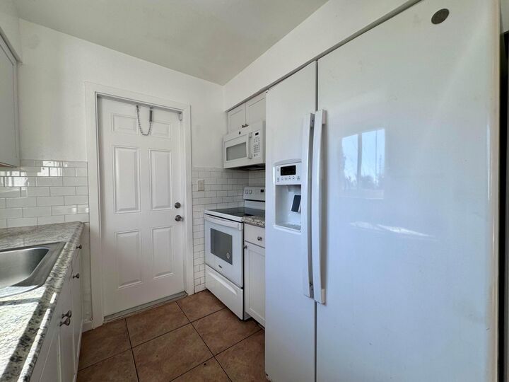 Property Photo:  3101 NE 7th Avenue B  FL 33064 