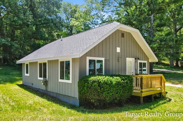 Property Photo:  8660 Merry Drive NE  MI 49341 