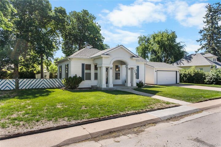Property Photo:  4444 S Lincoln Street  CO 80113 