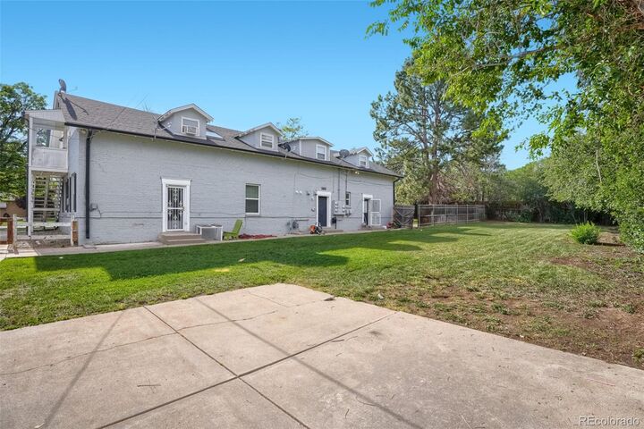 Property Photo:  493 Fulton Street  CO 80010 