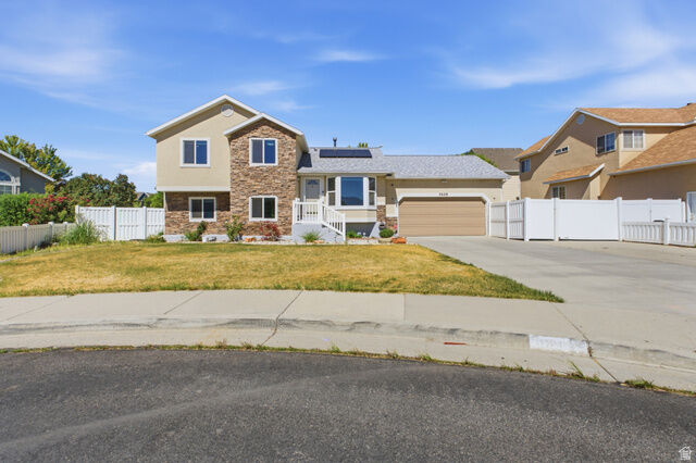 Property Photo: 3628 S Lionheart Way UT 84119
