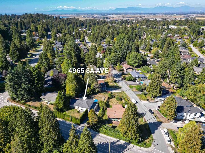 Property Photo: 4965 8A Avenue BC V4M 1T2